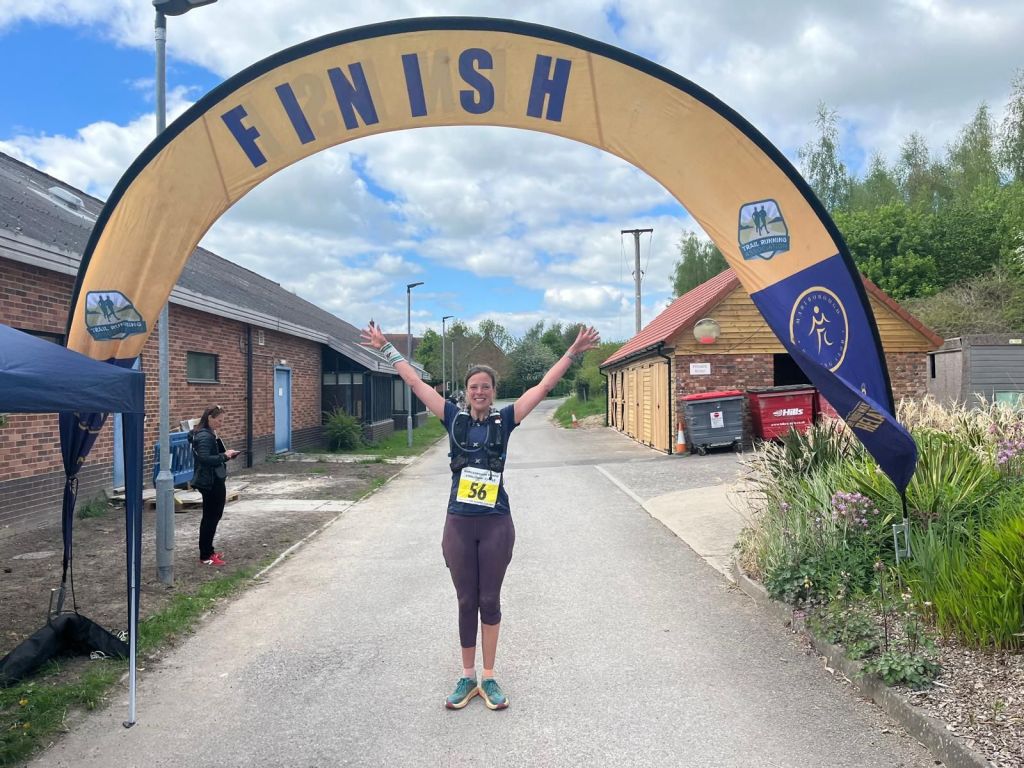 Loes celebrating at the finish line