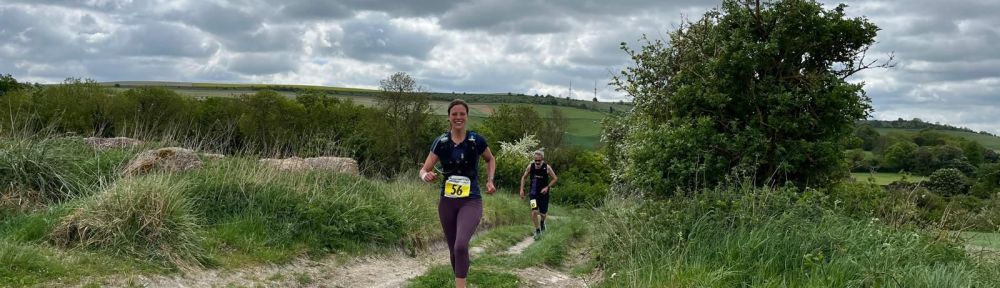 Loes running Malborough Downs challenge