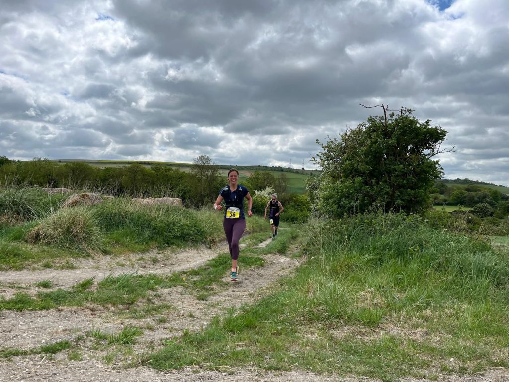 Loes running Malborough Downs challenge